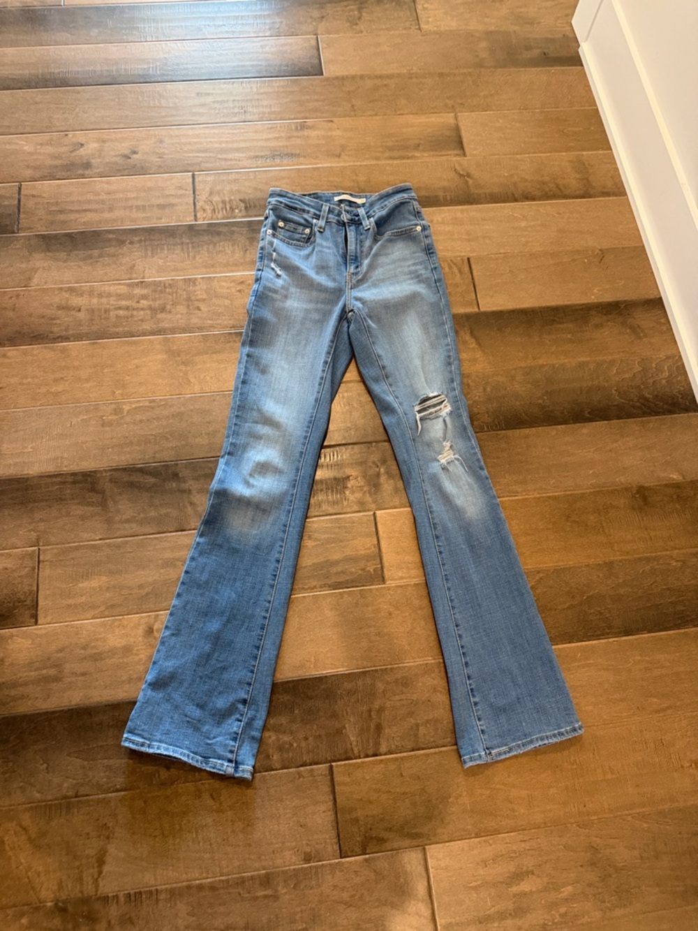 Women’s Light Blue Distressed Bootcut Jeans